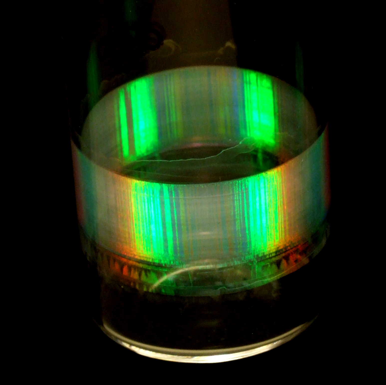 Digital photograph of synthetic opal under white-light illumination.